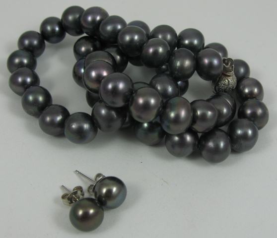 Appraisal: THREE ARTICLES OF BLACK PEARL JEWELRY including an black pearl