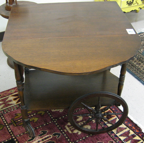 Appraisal: MAHOGANY TEACART AND SEWING STAND American c 's The lot