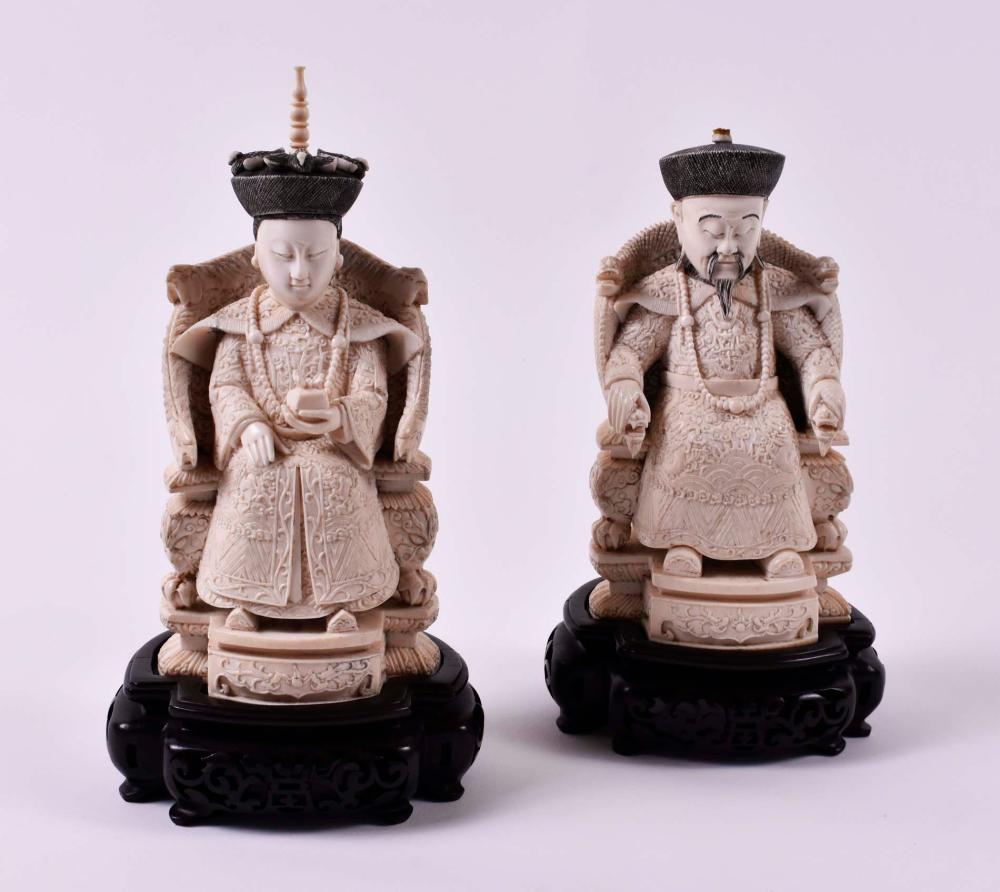 Appraisal: CHINESE CARVED EMPEROR AND EMPRESSEach figure elaborately dressed and seated