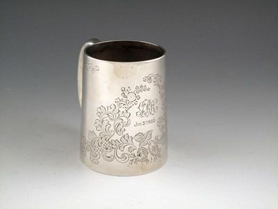 Appraisal: An Edwardian silver christening mug by Mark Willis Sheffield tapering