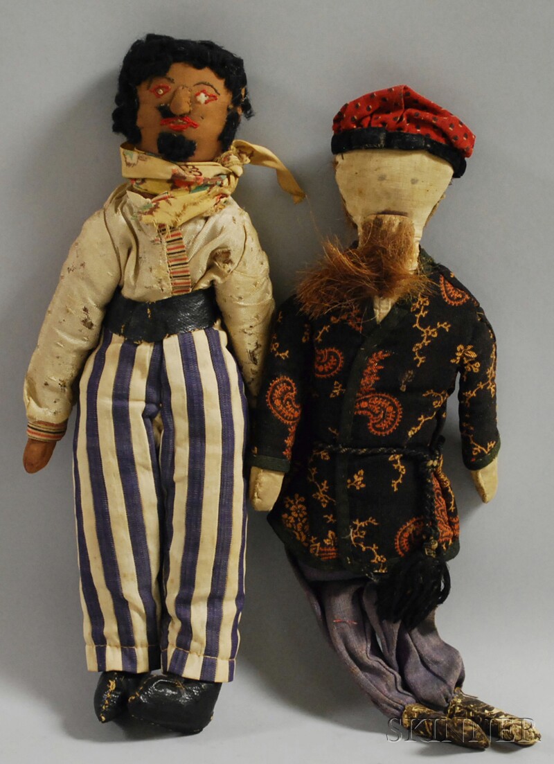 Appraisal: Two Ethnic Costumed Hand-stitched Cloth Male Dolls ht in