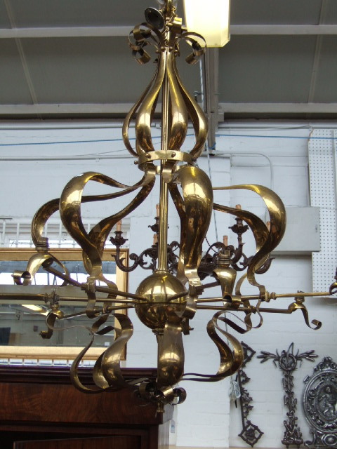 Appraisal: An English Art Nouveau brass chandelier circa with seven downswept