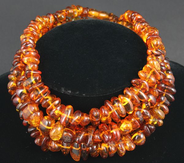 Appraisal: Group of three amber necklacesGroup of three amber necklaces l