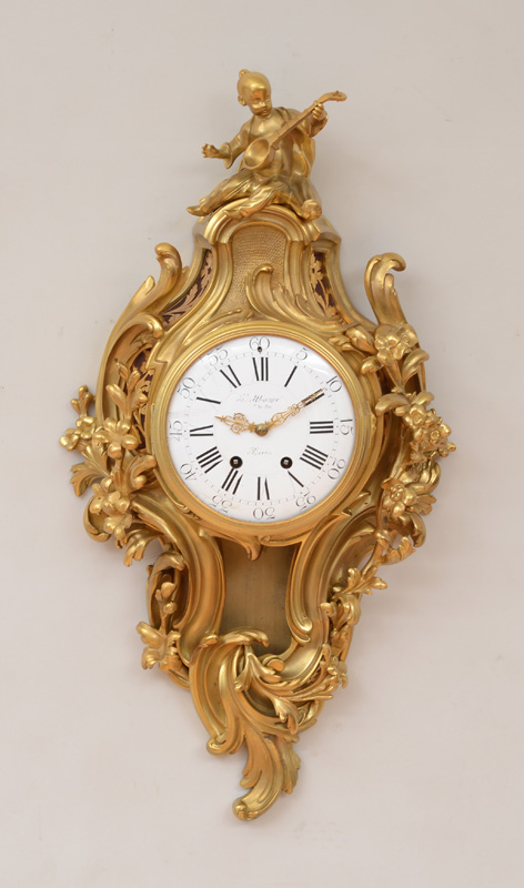 Appraisal: LOUIS XV STYLE GILT-BRONZE CARTEL CLOCK The enamel dial signed