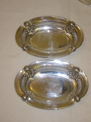 Appraisal: A PAIR OF BONBON DISHES of oval form with pierced