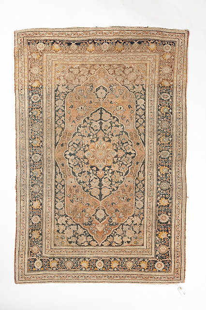 Appraisal: A TABRIZ RUG with central foliate medallion within a triple