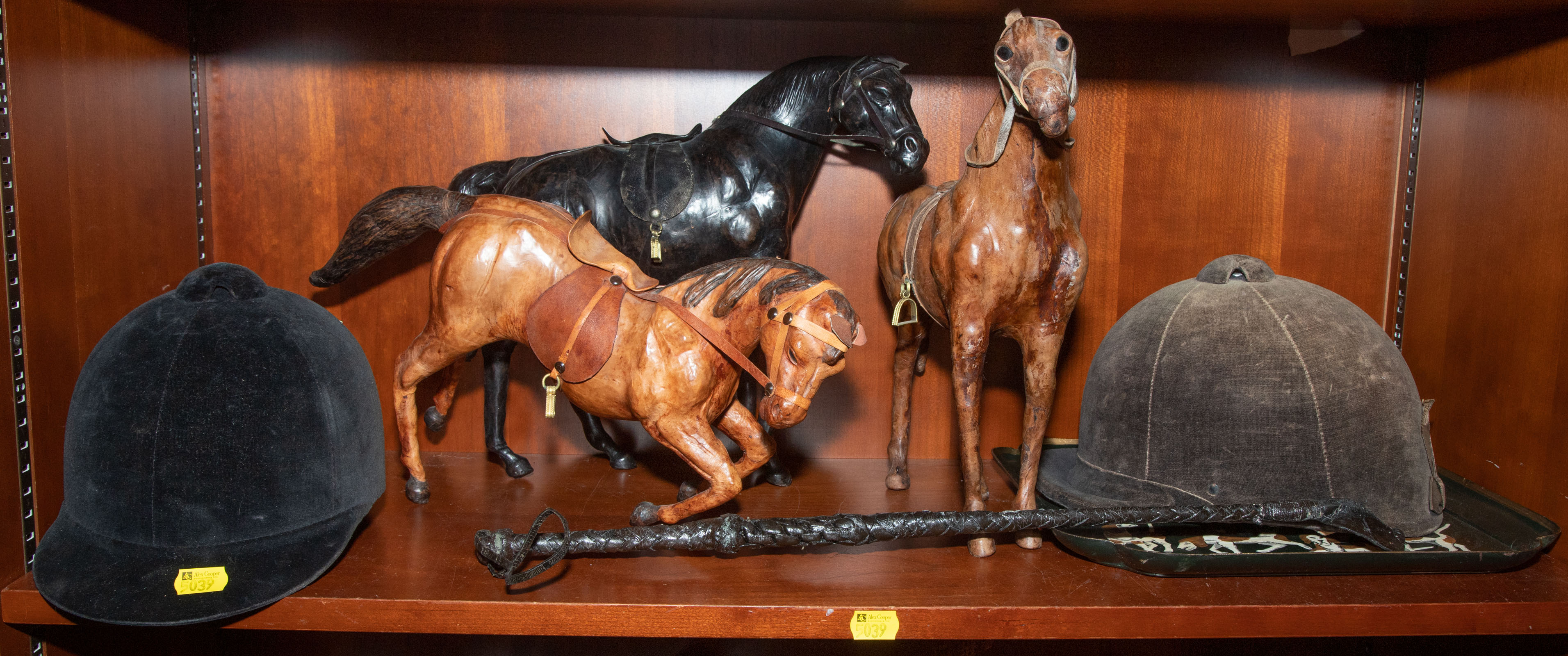 Appraisal: ASSORTED HORSE RIDING EPHEMERA Includes three leather horses two hiding