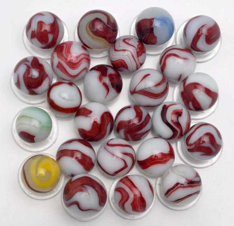 Appraisal: Lot of Akro Agate Oxblood Marbles Description Includes white onyx