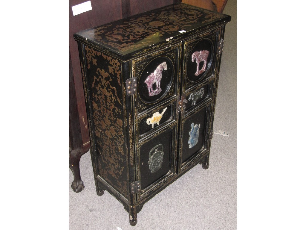 Appraisal: Chinese lacquered cabinet with soapstone panels