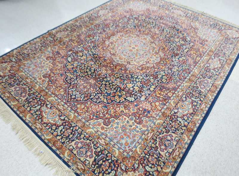 Appraisal: KARASTAN AMERICAN ORIENTAL CARPET 'Medallion Kirman' pattern machine loomed Karastan