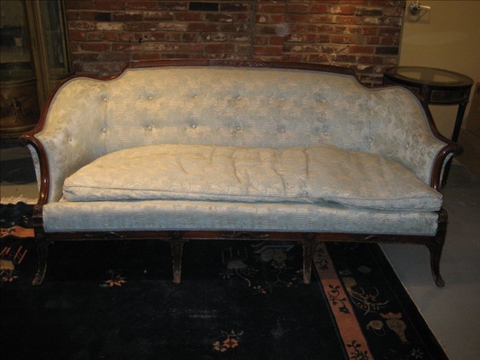 Appraisal: GEORGIAN STYLE MAHOGANY SOFA th c the shaped carved back