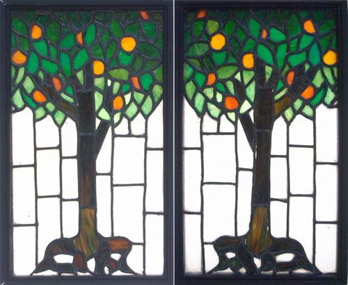 Appraisal: LEADED GLASS Pair of small windows depicting fruiting trees in