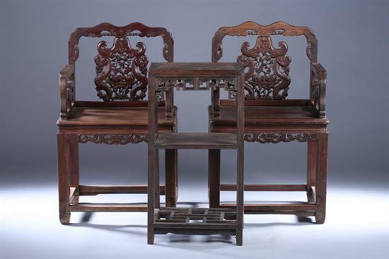 Appraisal: TWO CHINESE PEACHWOOD ARMCHAIRS AND TABLE th century Back carved