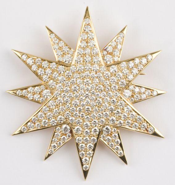 Appraisal: KT Yellow Gold Star Brooch hand fabricated star brooch with