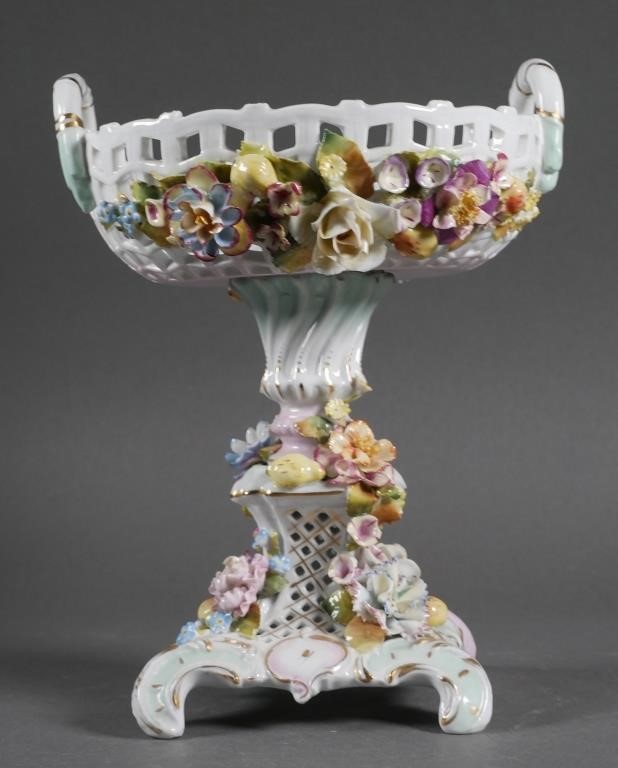 Appraisal: Ornately decorated with floral bouquet ceramic compote marking double crossed