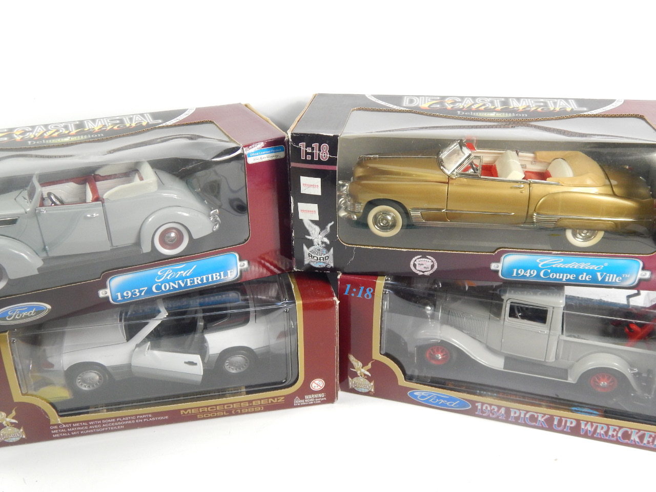 Appraisal: Four scale die cast model vehicles with original boxes