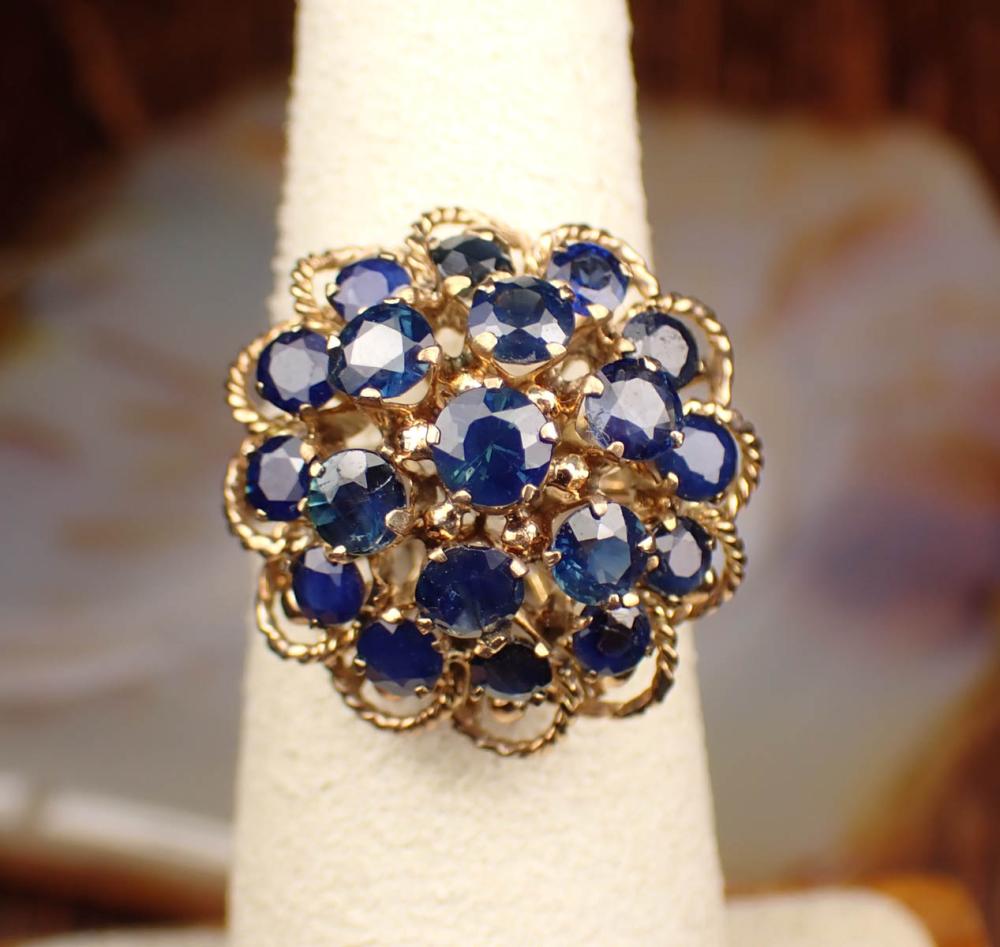 Appraisal: SAPPHIRE AND FOURTEEN KARAT GOLD THAI PRINCESS RING The yellow