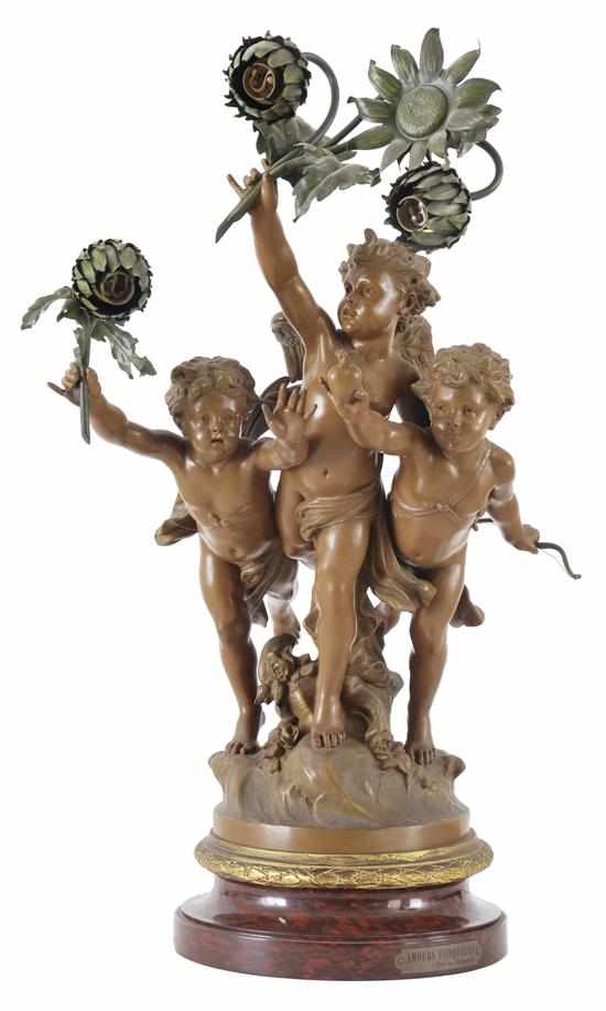 Appraisal: A LARGE CAST SPELTER THREE CHERUB LAMP WITH A ROUGE