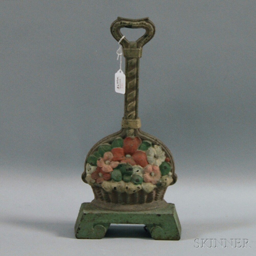 Appraisal: Painted Cast Iron Flower Basket Doorstop early th century scattered