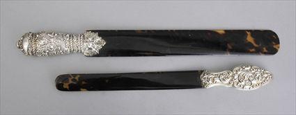 Appraisal: TWO ENGLISH SILVER-HANDLED TORTOISESHELL PAGE CUTTERS William Comyns London and