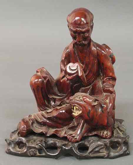 Appraisal: Chinese carved rosewood figure Power of Learning h x w