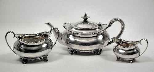 Appraisal: An Edward VII bachelor's silver three piece tea service with