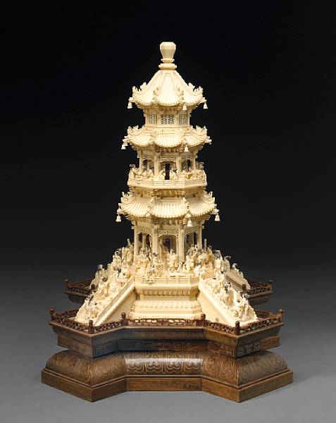 Appraisal: A pieced ivory pagoda with figures th Century Featuring beauties