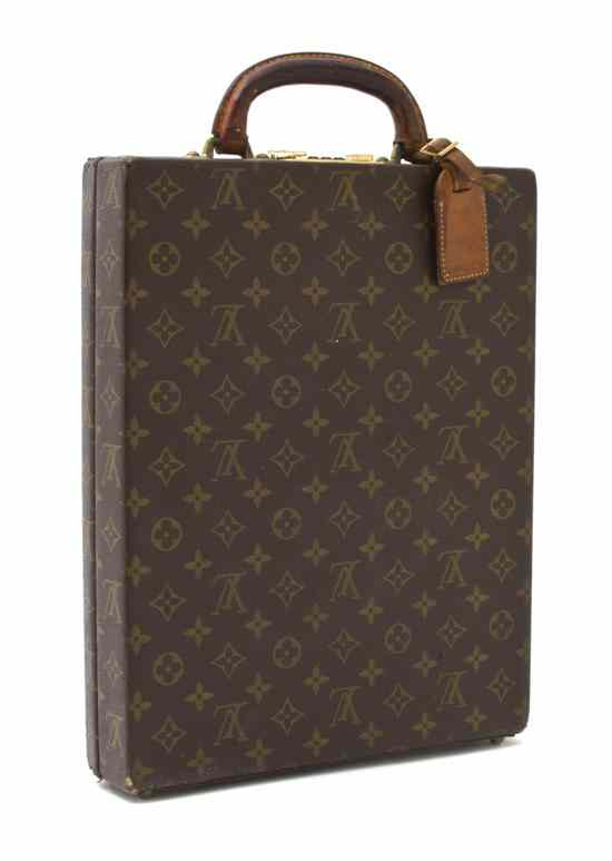 Appraisal: A Louis Vuitton Monogram Canvas Hardsided Briefcase brown leather handle