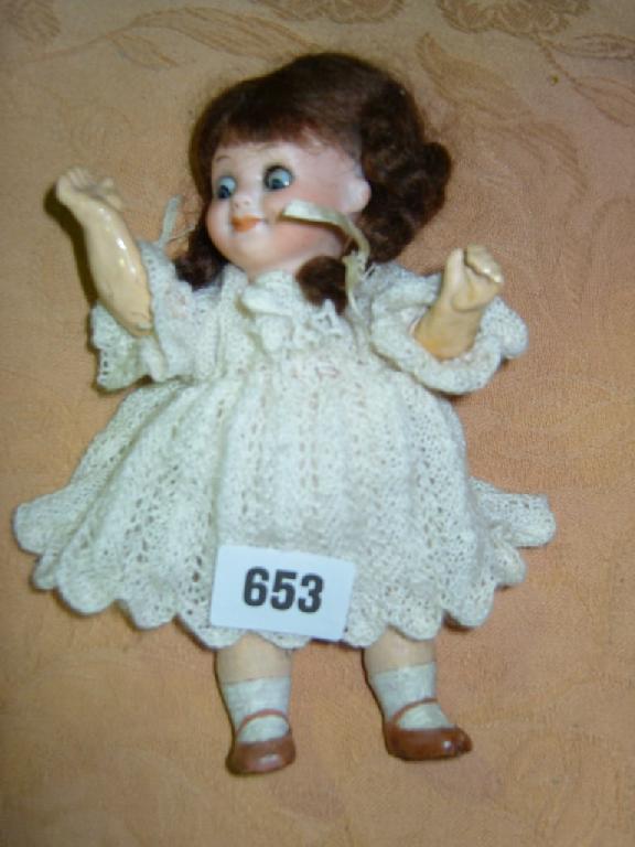 Appraisal: A small Armand Marseille bisque headed googly eyed doll with