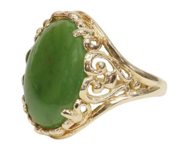 Appraisal: Estate kt yellow gold ring green jade oval cabochon in