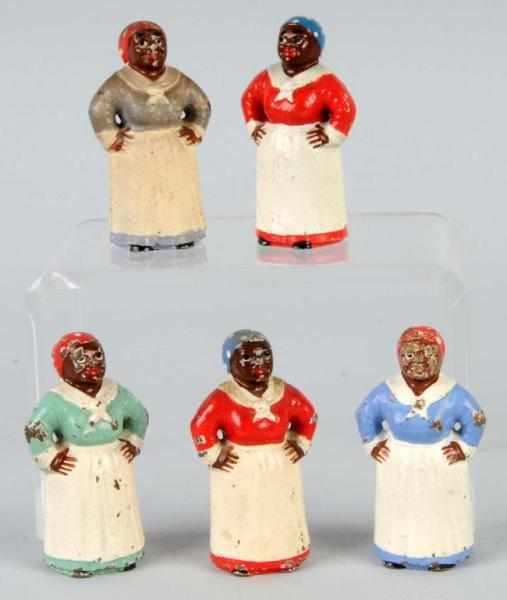 Appraisal: Lot of Cast Iron Mammy Paperweights Description Made by Hubley