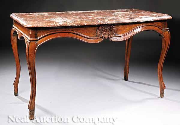 Appraisal: A Continental Rococo Carved Walnut Console Table th c with