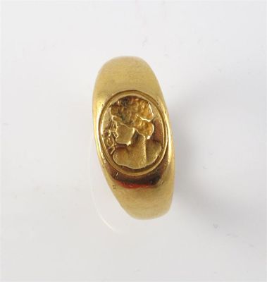 Appraisal: A gold signet ring Carved with the head of Hermes