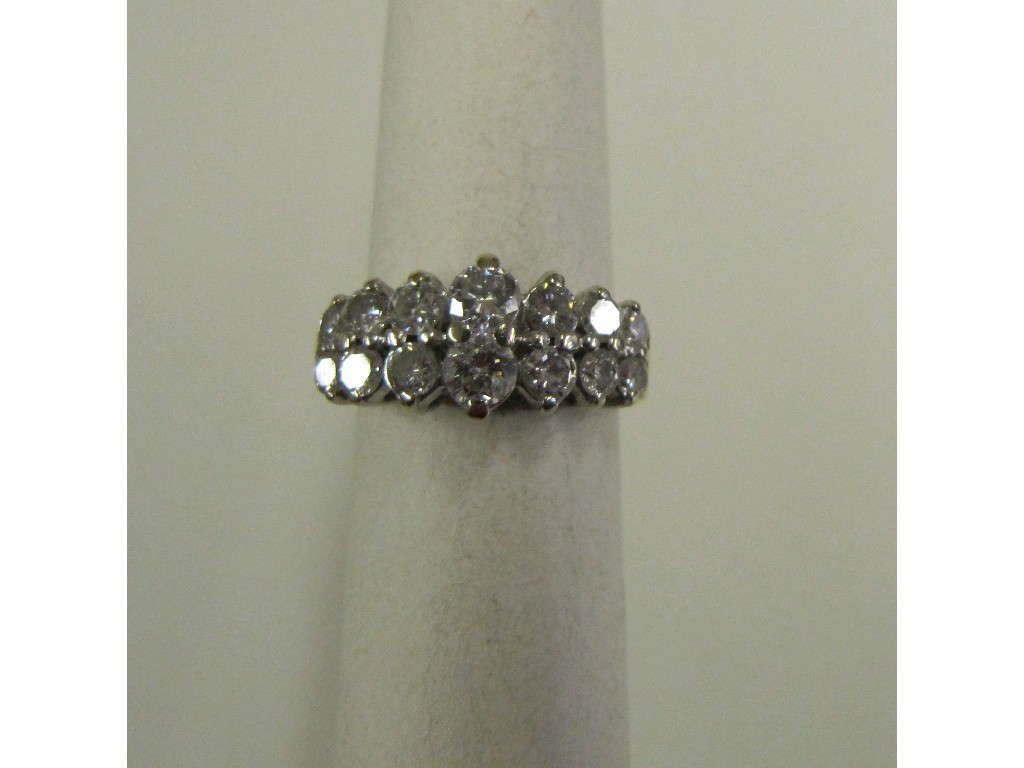 Appraisal: Eighteen carat gold fourteen stone diamond dress ring with a