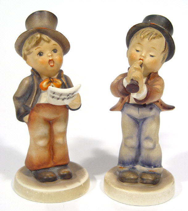 Appraisal: Hummel musician and a choir boy both with hand painted