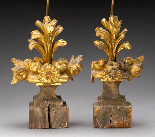 Appraisal: A pair of Italian carved giltwood finals late th early