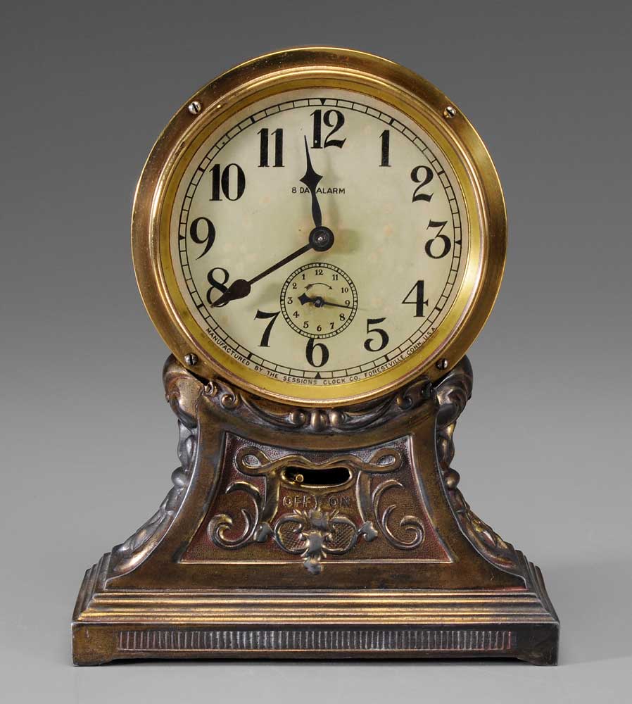 Appraisal: Sessions Eight-Day Alarm Clock American circular brass clock with cast