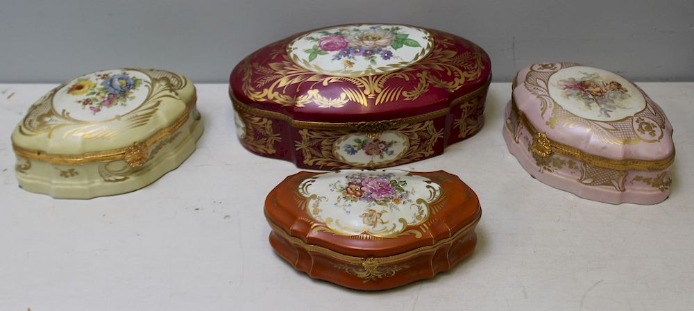 Appraisal: Lot Of Large Decorated Porcelain Vanity Boxes Assorted sizes ranging