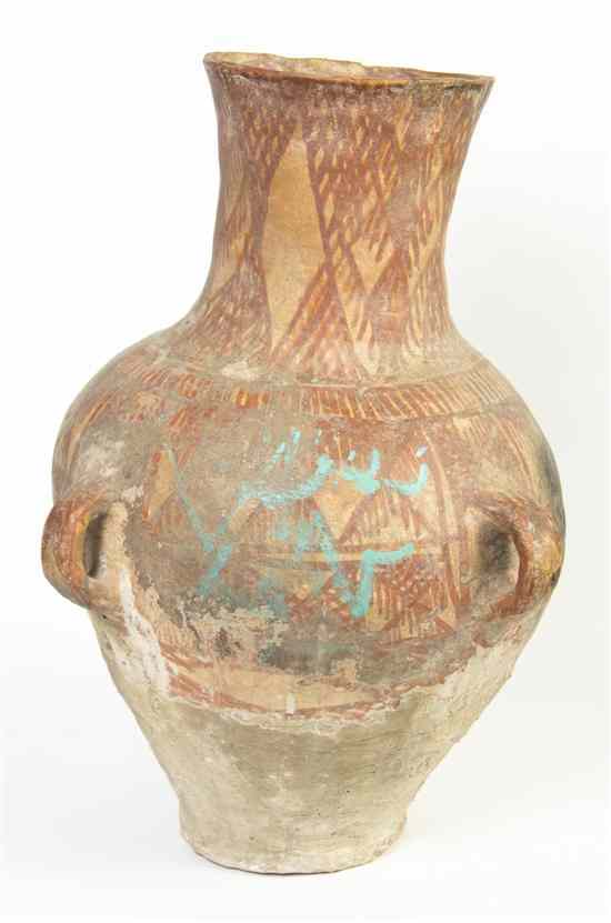 Appraisal: A Near Eastern Buff Pottery Amphora with ovoid body side