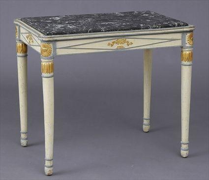 Appraisal: DIRECTOIRE CREAM-PAINTED AND PARCEL-GILT CENTER TABLE The top fitted with