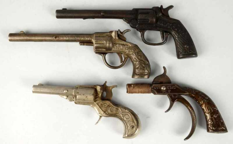 Appraisal: Lot of Cast Iron Cap Pistol Toys Description Includes one