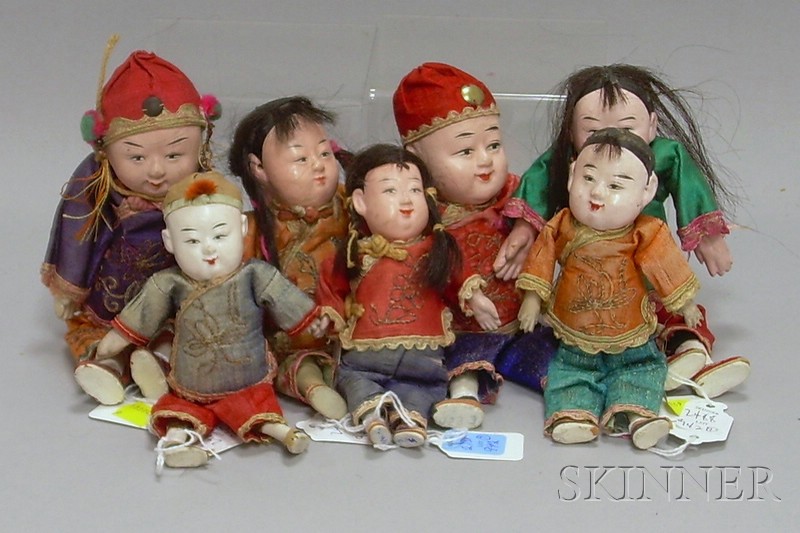 Appraisal: Seven Small Chinese Dolls ht to in