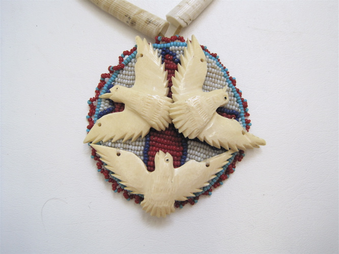 Appraisal: NATIVE AMERICAN BEADED PENDANT NECKLACE shell and beaded necklace supporting