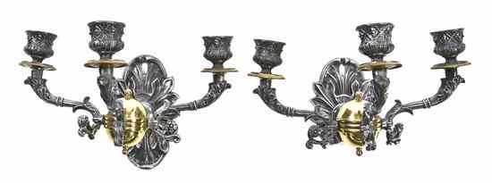 Appraisal: A Pair of Neoclassical Silvered Metal and Brass Three-Light Sconces