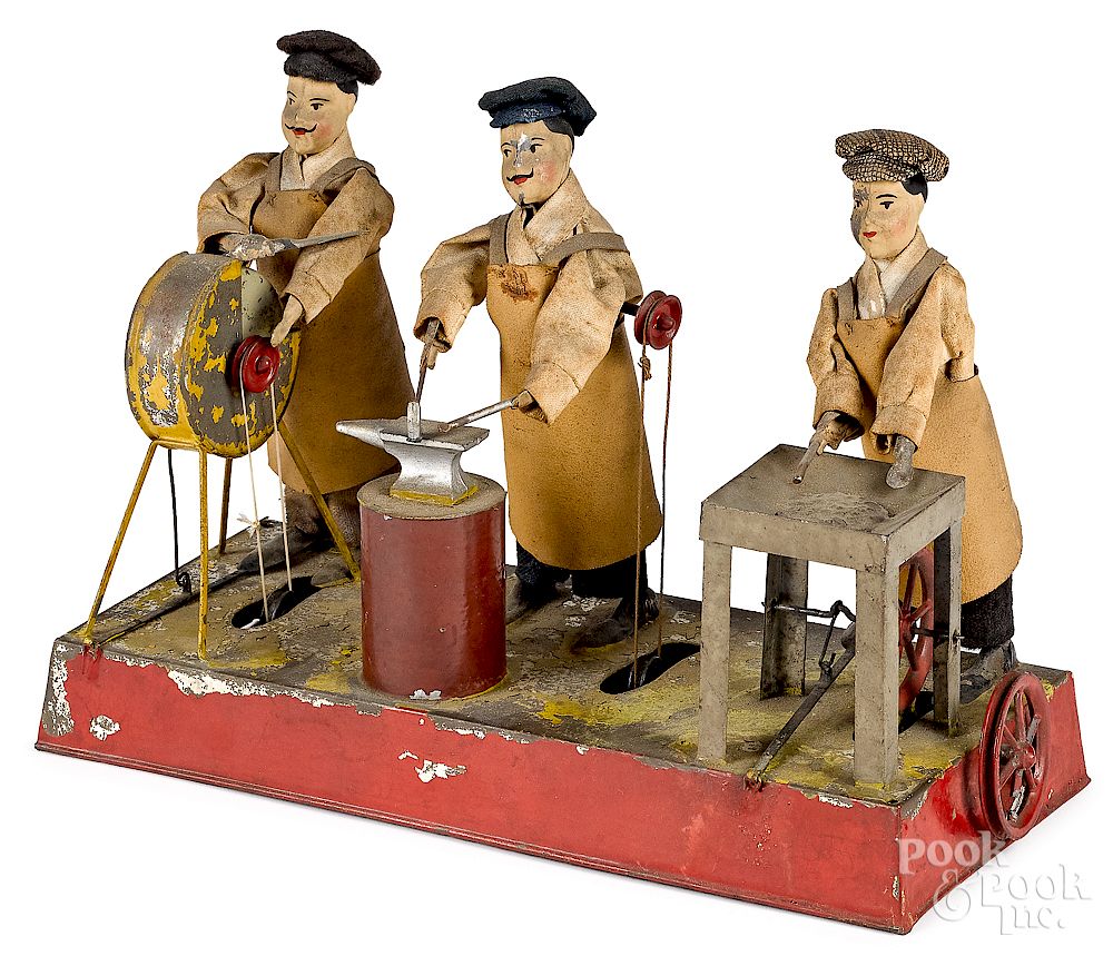 Appraisal: Schoenner three-man workshop steam toy accessory Early Schoenner painted tin