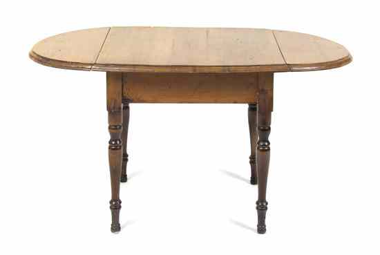 Appraisal: An American Oak Drop-Leaf Table having a rectangular top and