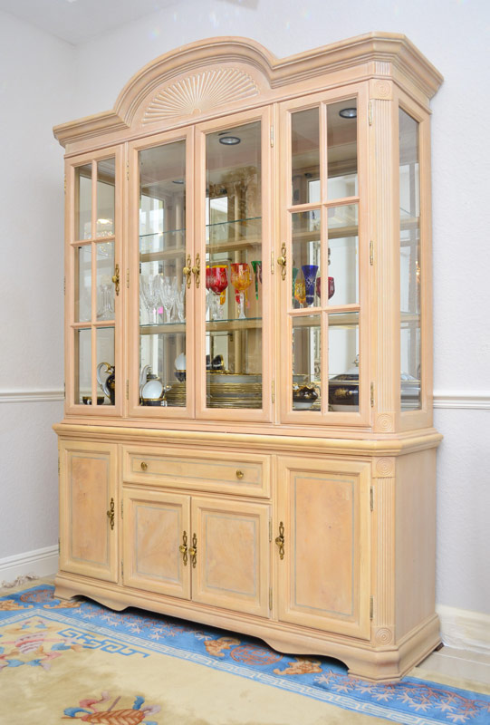 Appraisal: A MODERN PICKLED FINISH CHINA CABINET Two part cabinet with