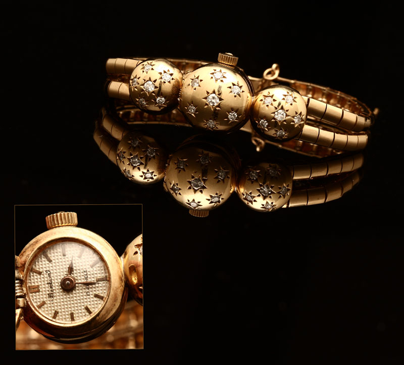 Appraisal: A ladies' retro diamond and K yellow gold covered watch