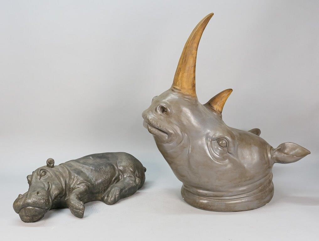 Appraisal: RHINOCEROS BUST AND RESTING HIPPOPOTAMUS SCULPTURERhinoceros bust and resting hippopotamus