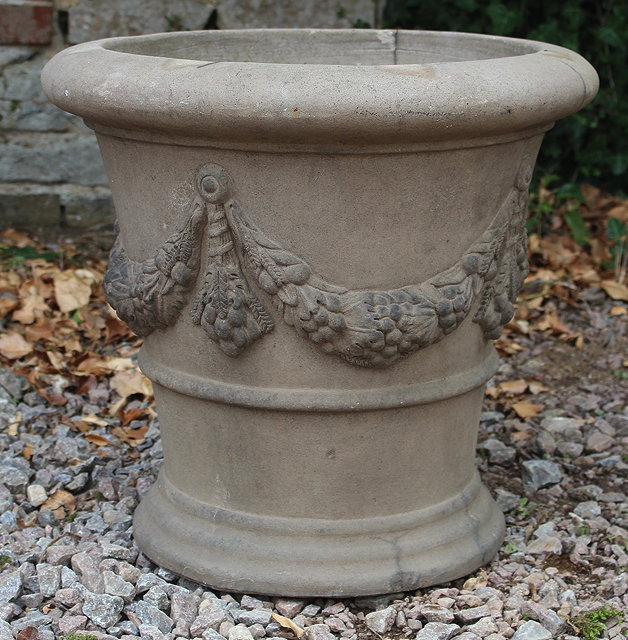 Appraisal: A DARK STONEWARE CIRCULAR PLANTER decorated with floral swags cm